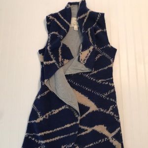 Anthropologie long woven vest with knit liner.